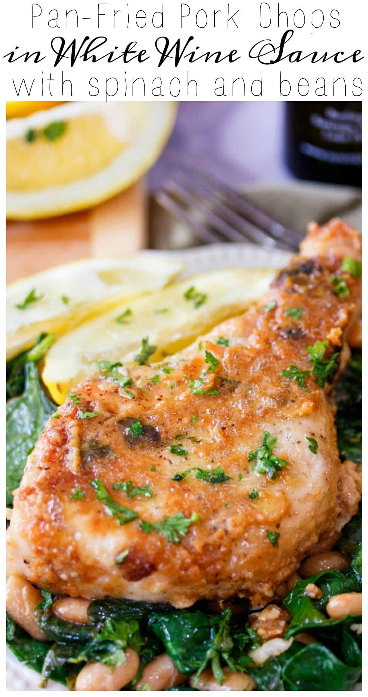 Savory Pork Chops fried to golden perfection in a white wine sauce served over a bed of garlicky spinach and white beans.